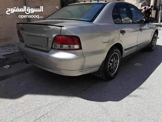 ميتسوبيشي جالانت 2005 لون بيج كوشوك جديد تواصل على الرقم بالوصف ابو عبدالله الدومي