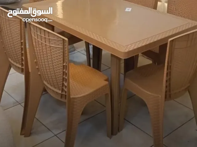 6 كرسي راتان سامبا الاصلي مع طاولة مستطيلة 120 سم طولها لم يستخدمو