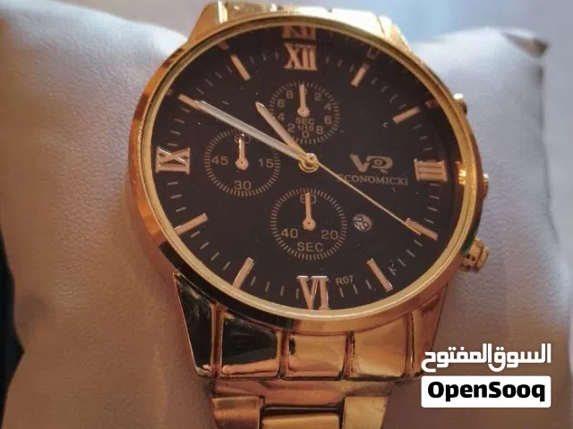 ساعه رجالي ذهبي اللون زي في الصورة