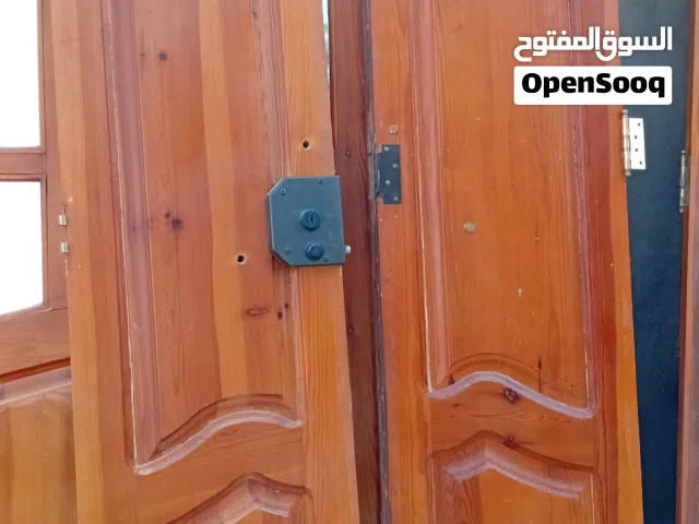 أبواب حديد واعمدة مضلله ورواشن أبواب لوح