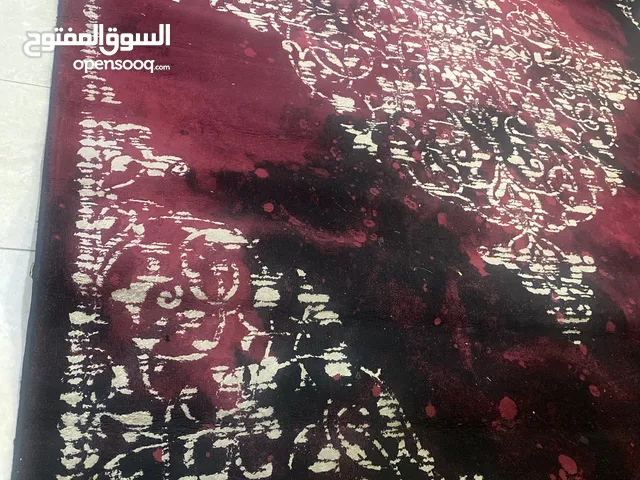 Almost new black and red carpet Turkish carpet