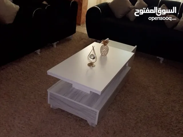 طاوله وسط مع سيرفيس