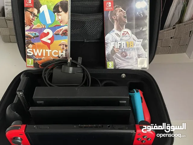 Nintendo switch with extra controllers and 2 games for sale