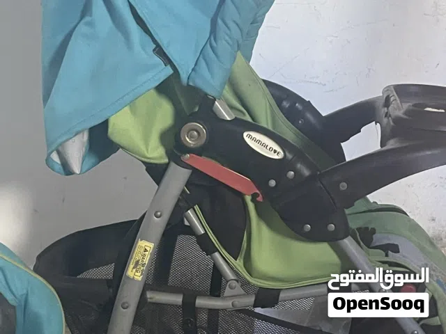 كروسة أطفال بحالة جيدة مع قعاد