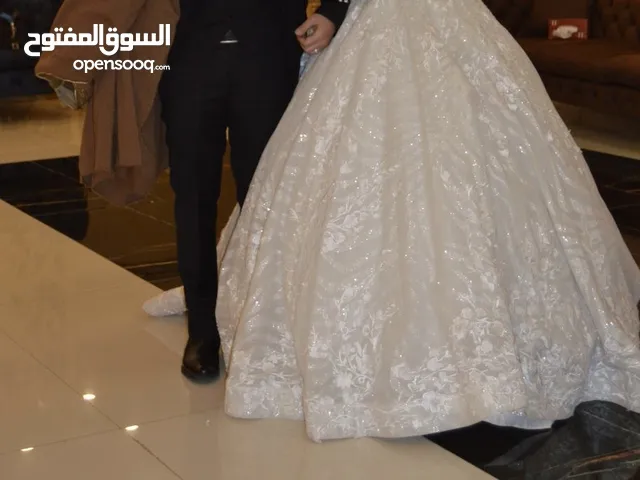 بدلة عروس ابيض