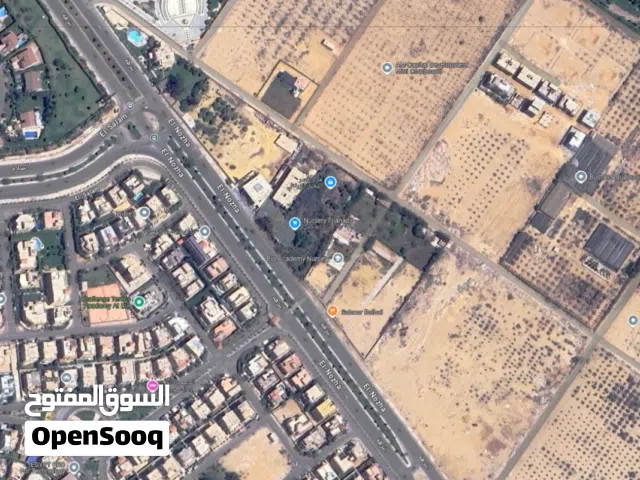 أرض تخصيص سكني تجاري ( متاح تتعمل فندقي بالكامل ) في الشيخ زايد على طريق النزهة الرئيسي