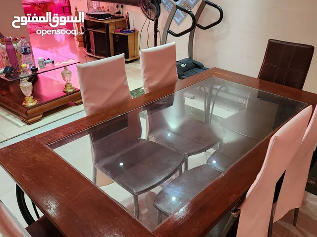 Dinning set of 6 chairs 150 rials, pink sofa set 150 omr,  green sofa set with covers 125 omr