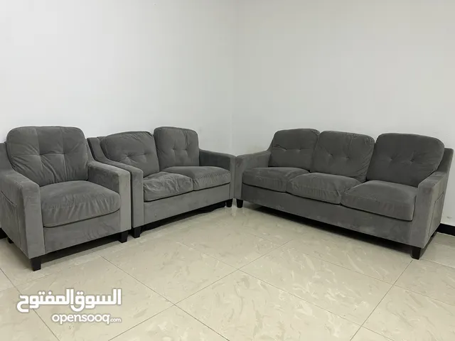 طقم كنب وغاز وجرة وساعة وغسالة