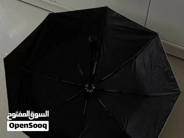 مظلة كبيرة وقوية للمطر والشمس – نظيفة جداً
