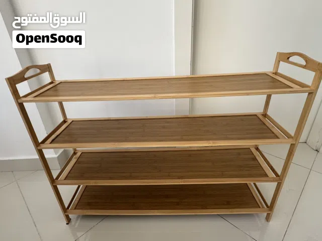 Multi-tiered bamboo wood shoe rack for hallway and corridor. High quality