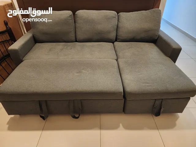 L sofa and single bed