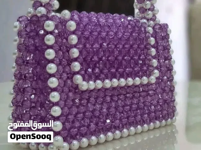 شنط خرز هاند ميد