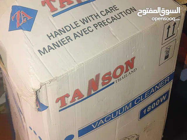 مكنسة كهربائية شبه جديدة بالكرتون والمشمعات