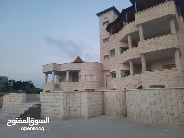بيع ارض مع مزارع وع فبلا ججر