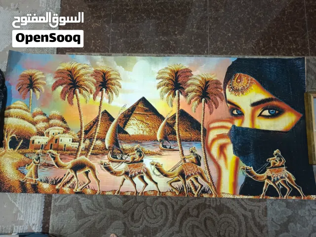 لوحات فنيه مرسومه رسم اليد بالوان اصليه على ورق البورده وعلى قماش كانفس اصلي