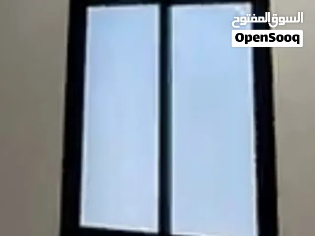 أبواب حديد و خشب و المنيوم هناجر قرميد ستائر  أبواب سحاب جلد_نوافذ المنيوم تلبيس الأبواب بديل الخشب