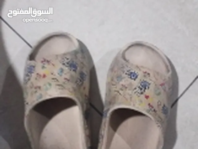 GUESS Slippers & Flip flops in Ajman