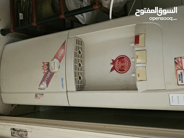 Water dispenser with cold, hot and storage unit at the bottom