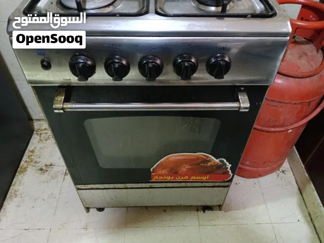 Four-burner gas stove, working oven and grill, with hose, regulator, and gas cylinder, 22 kg, price