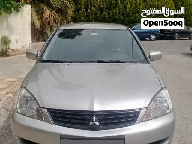 2013 ميتسوبيشي لانسر Standard