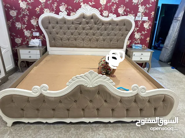 King size bed in fair condition for sale.