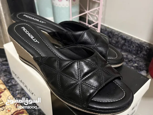 Black With Heels in Muscat
