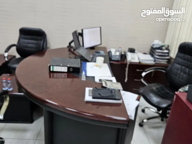 أثاث مكتب وطاولة اجتماعات ومكتب استقبال وطقم جلوس وبراد ومبرد ماء Cooler وخزن