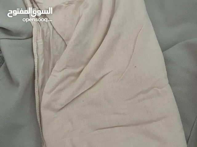 جديد وغير مستعمل – شال قطني بلون مشمشي فاتح عملي وصيفي بسعر رائع!