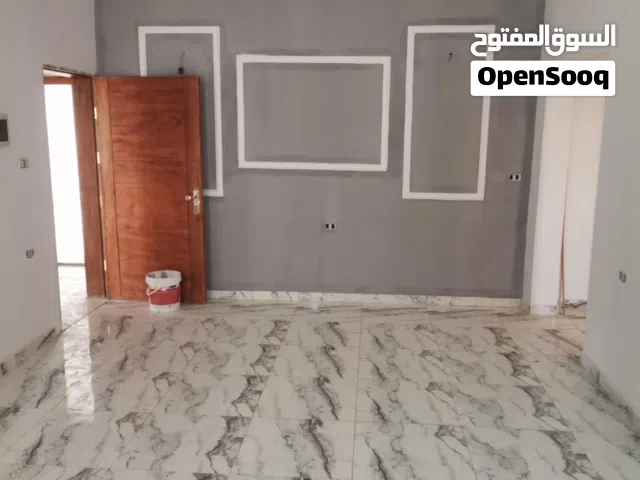 شقه في دور اول  للايجار تاجوراء طريق مصانع بتحديث مقسم سكني خلف مسجد النور