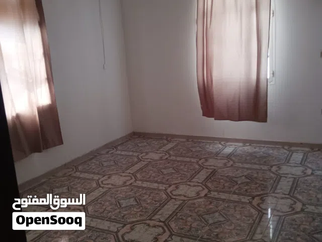 Azaiba room with attached bathroom semi furnished العزيبه غرفه مع حمام مفروشه جزئي خلف بناية تثمير