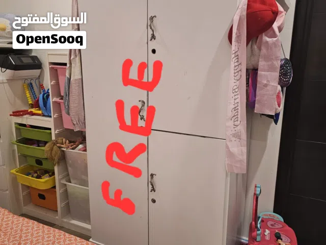Bed , mattresses,  cupboard free