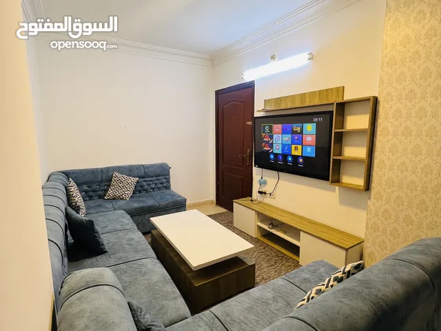 شقه مفروشه اثاث شبه جديد خلف اربيلا مول طابق اول مكيفه مواقف سيارات تحت البنايه