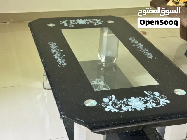 Very good glassTea table and sofa