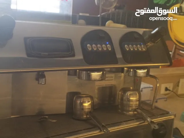 مكينههً قهوه وثلاجة ايس كريم
