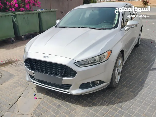 فورد فيوجن 2013 هايبرد للبيع المستعجل بحاجة الى دهان فقط بالصلاة على النبي سيارة جبارة