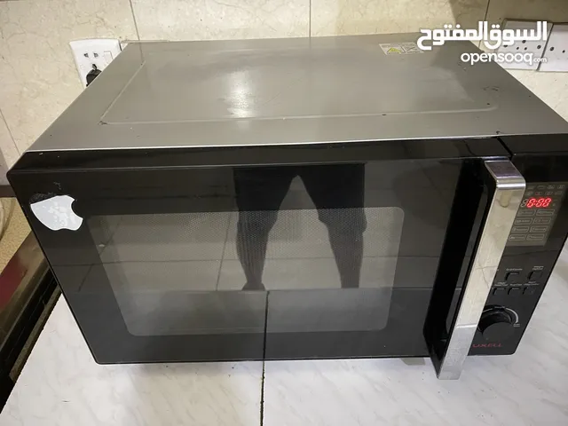 مايكرو ويف LUXELL بحالة جيدة جدا ، غير مفتوح ولامصلح شغال ومابيه اي مشكلة