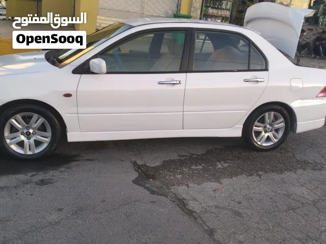2013 ميتسوبيشي لانسر Standard