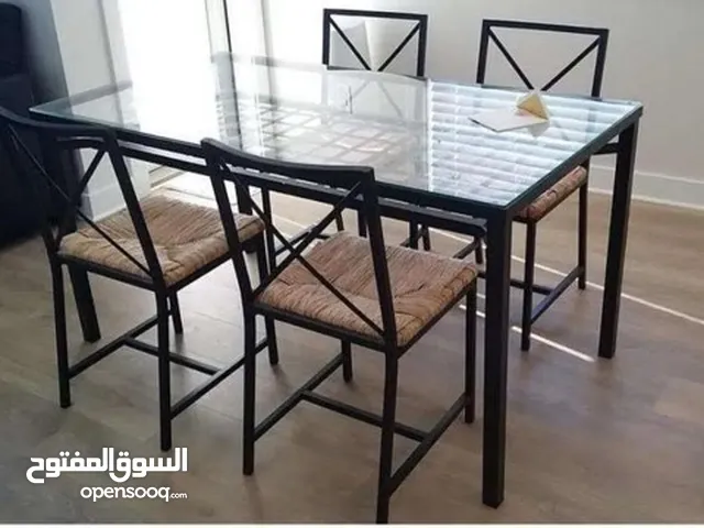 IKEA glass dining table + 4 chairs