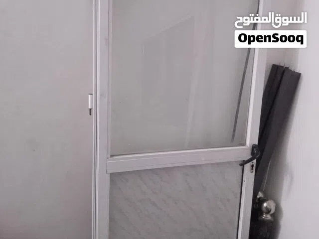 باب ألمنيوم مع شبك + الحلوق تبعته للبيع