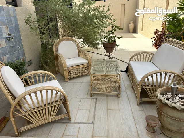 Cane garden furniture set.