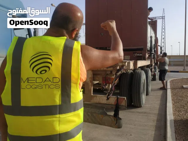 خدمات ربط و تأمين و نقل المعدات و الآليات الثقيلة