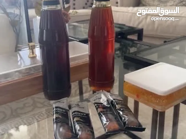 2 bottles of natural honey 1 bottle sidr and 1 bottle samr and 4 spoons of ginger honey and black