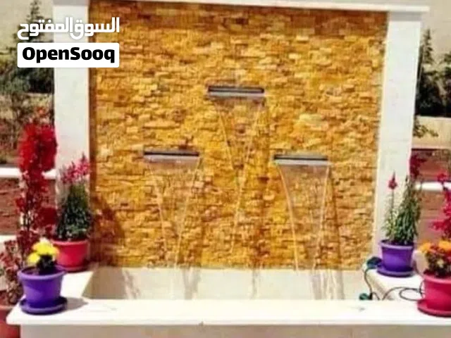 تركيب ديكورات حجرية نوافير شلالات باربكيو