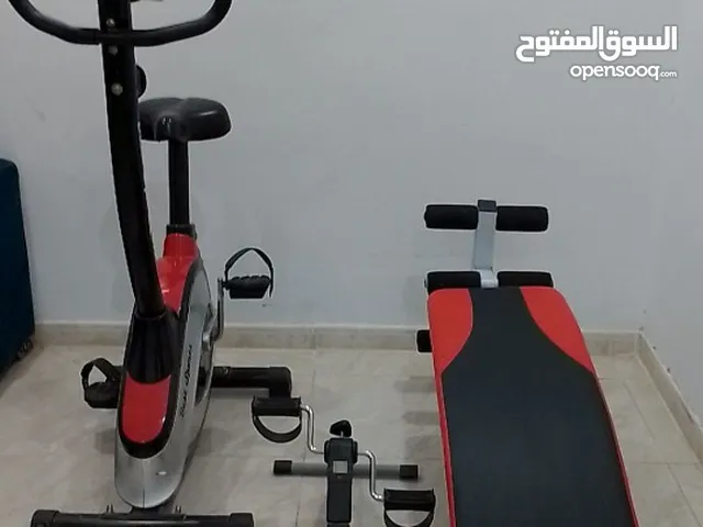 دراجة تمارين مع هدية جهاز تمارين لشد البطن وجهاز مشاية لعضلات الساقين