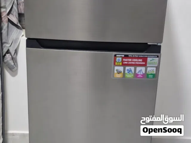 Refrigerator and gas cylinder