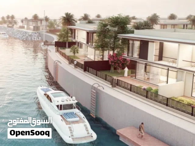 Falcon island canal view waterfront villa  Al Hamrah village