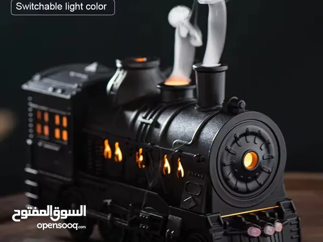 قطار البخار الصغير مش بس ملطف جو... تحفة فنية تنفث راحة وعطر! عيش تجربة بخار خرافية... جو دافئ،