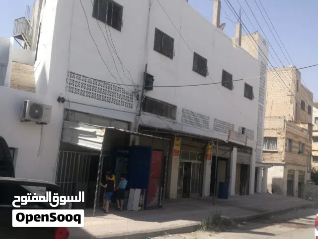 5 محلات + 9 شقق للبيع