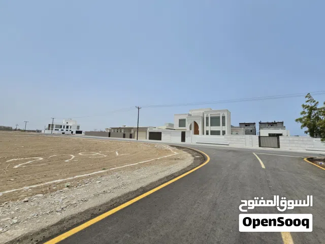 ارض في بركاء مجاوره للمعبيله الجنوبية قريب شارع سلطان قابوس