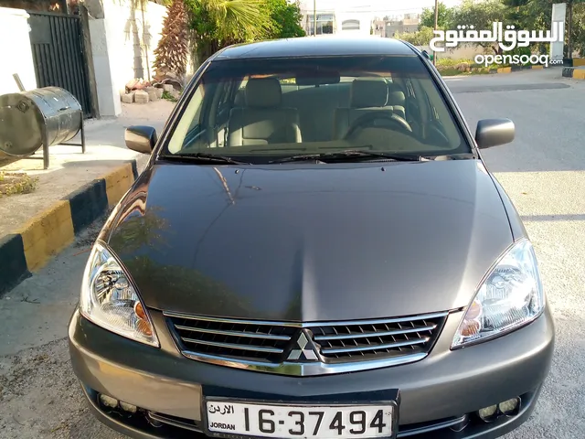 متسوبيشي لانسر موديل 2005 اتوماتيك بحاله
 واقتصادية جدا